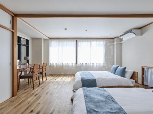 Ένα ή περισσότερα κρεβάτια σε δωμάτιο στο LIVE HEART House