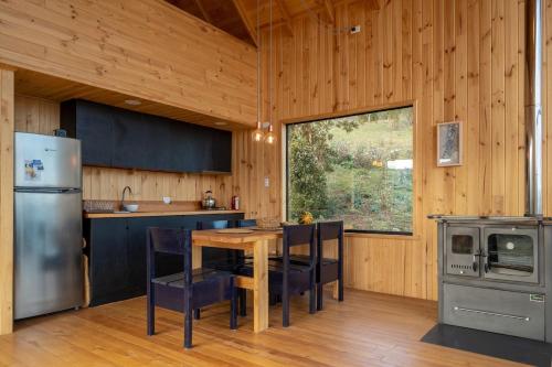 Kuchyň nebo kuchyňský kout v ubytování Hermosa cabaña en Dalcahue - Chiloé