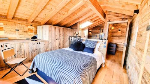 En eller flere senge i et værelse på Chalet 1ère Étoile une vue à couper le souffle