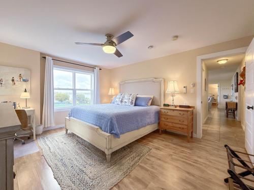 Ένα ή περισσότερα κρεβάτια σε δωμάτιο στο Scenic Harbour View House Waterfront