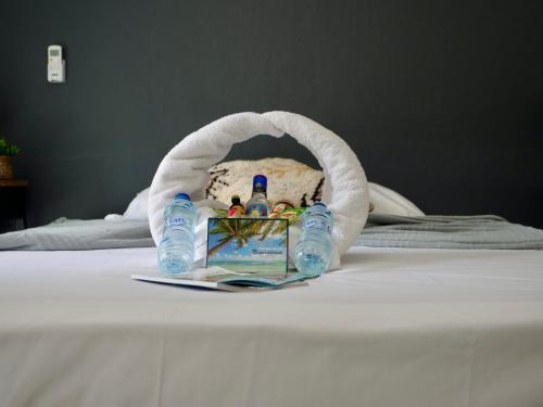 Ένα ή περισσότερα κρεβάτια σε δωμάτιο στο Le 115, sympathique studio proche plage privée