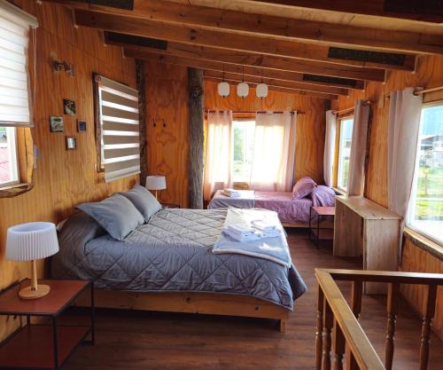 Ένα ή περισσότερα κρεβάτια σε δωμάτιο στο Casa Los Leones in Villa O'Higgins