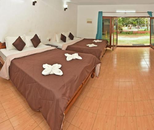 Ένα ή περισσότερα κρεβάτια σε δωμάτιο στο Bay View Villa