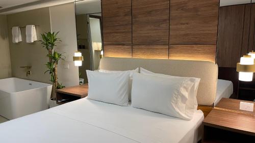 Postel nebo postele na pokoji v ubytování One Apartments Provenza