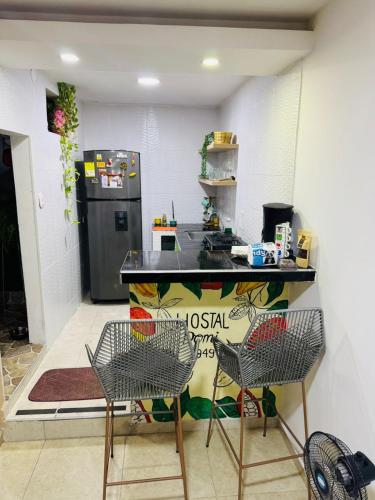 Köök või kööginurk majutusasutuses Hostal Domi 1949