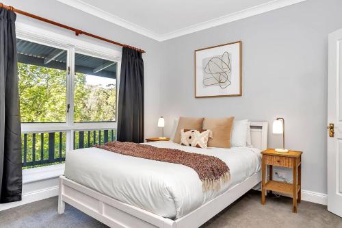 Ένα ή περισσότερα κρεβάτια σε δωμάτιο στο Vigneron Retreat Minutes to McLaren Vale Wineries