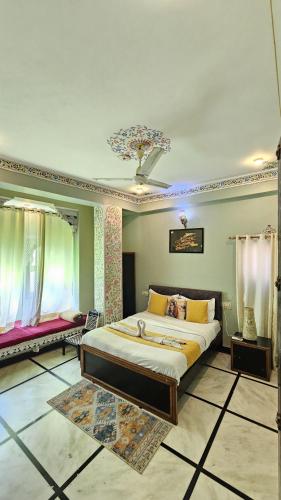 a bedroom with a large bed in a room at Mild Life Hostel Udaipur in Udaipur