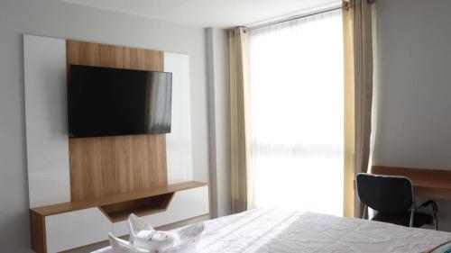 Μια τηλεόραση ή/και κέντρο ψυχαγωγίας στο Hotel Florez Boutique