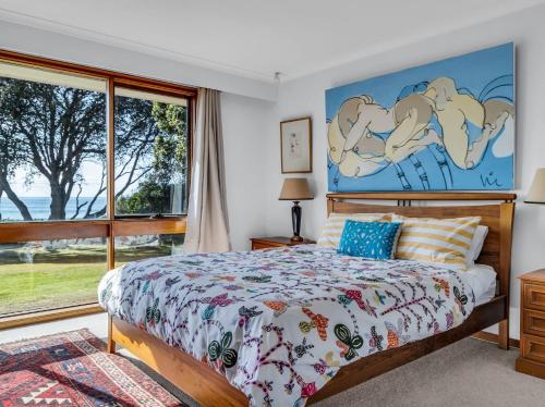 Giường trong phòng chung tại Art House - 4 Bedroom