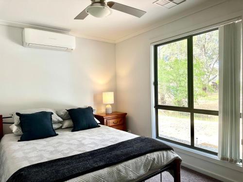 Ένα ή περισσότερα κρεβάτια σε δωμάτιο στο Among the Gums