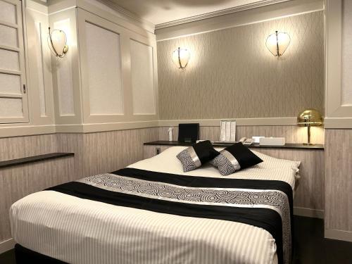 Postel nebo postele na pokoji v ubytování Hotel PRINCESS2 -大人専用-
