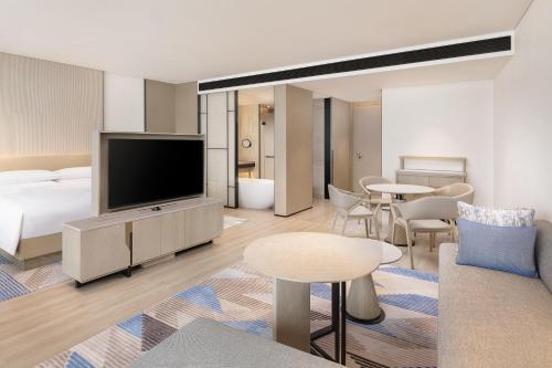 TV a/nebo společenská místnost v ubytování Sheraton Beihai Resort