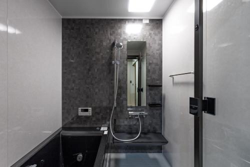 Ένα μπάνιο στο tonaResort Furano