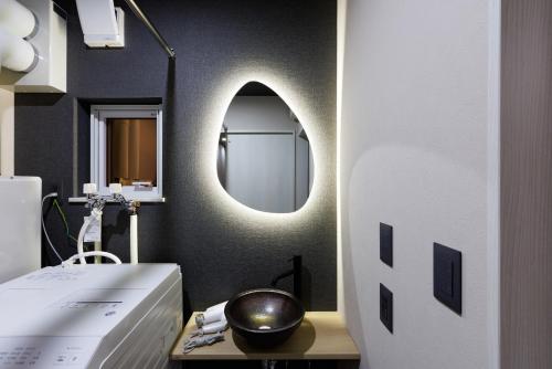 Ένα ή περισσότερα κρεβάτια σε δωμάτιο στο tonaResort Furano