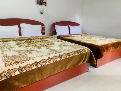 Ένα ή περισσότερα κρεβάτια σε δωμάτιο στο Misty Crown