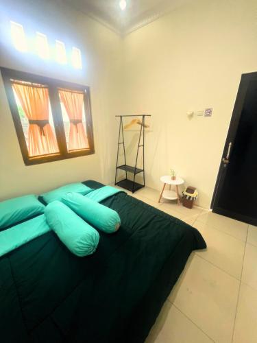 Photo de la galerie de l'établissement SIJI Homestay Purwokerto, à Purwokerto