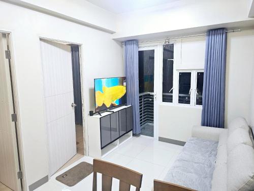 Χώρος καθιστικού στο Riverview Suites Manila