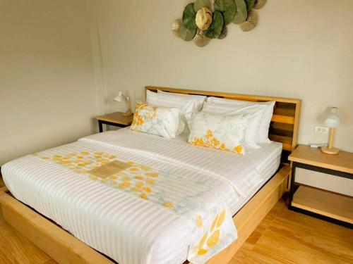 Postel nebo postele na pokoji v ubytování Secrest Boutique Kohtao Thailand