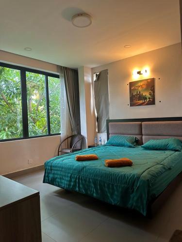 Postel nebo postele na pokoji v ubytování AhuraMazda Hotel