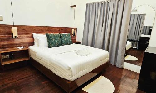 Ένα ή περισσότερα κρεβάτια σε δωμάτιο στο Bellamar Villas