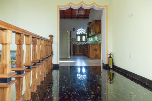 a room with a pool of water in a church at Sri Lagoon Villa in Negombo