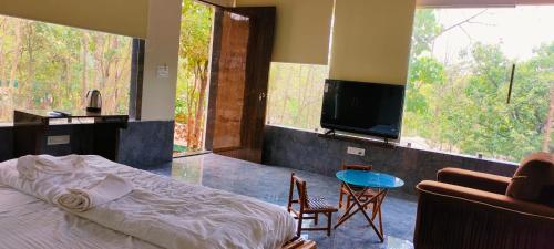 TV a/nebo společenská místnost v ubytování Ajuba Gav Resort