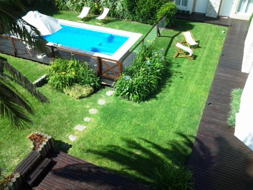 an aerial view of a yard with a swimming pool at Villa Nuccia Hotel Boutique in Mar del Plata