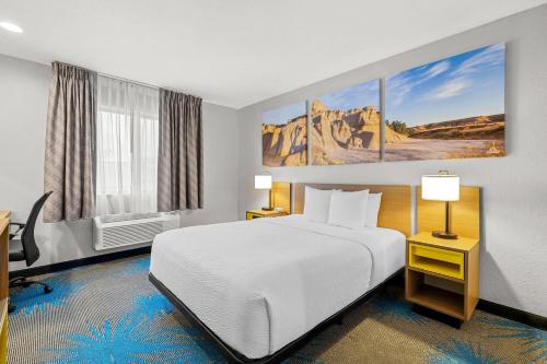 Ένα ή περισσότερα κρεβάτια σε δωμάτιο στο Days Inn by Wyndham Wall