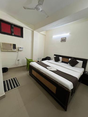 Ένα ή περισσότερα κρεβάτια σε δωμάτιο στο Hotel Red Rose