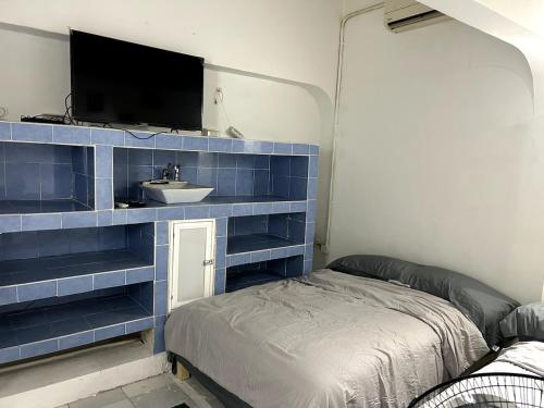 Giường trong phòng chung tại caipiriña mix