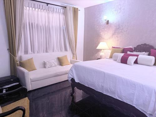 Ένα ή περισσότερα κρεβάτια σε δωμάτιο στο Bernies Blue Heaven