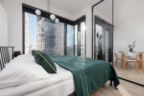Towarowa Towers Studio with Free Gym Access and Balcony by Noclegi Renters