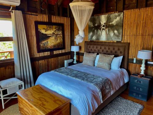 Ένα ή περισσότερα κρεβάτια σε δωμάτιο στο House 23 Ezulwini in Sodwana Bay Lodge