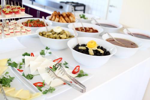 a buffet of food on a table at Fethiye Pension in Fethiye