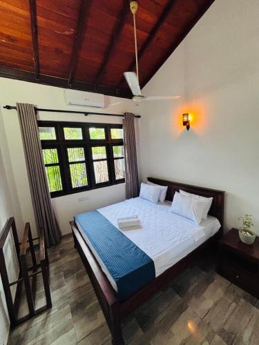 Voodi või voodid majutusasutuse Solara Stay Dickwella toas