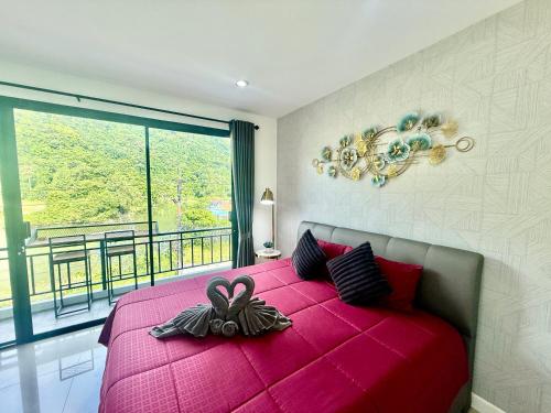 Una cama o camas en una habitación de TN KAMALA Room For Rent