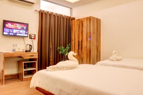 Una cama o camas en una habitación de Meadowlark