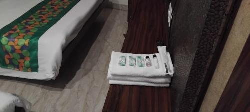 Ένα ή περισσότερα κρεβάτια σε δωμάτιο στο Shree Anand Dham Vrindavan