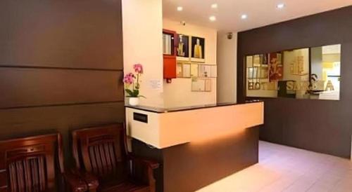 Η κουζίνα ή μικρή κουζίνα στο Hotel Sarina