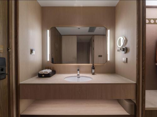 Ένα μπάνιο στο Orange Crystal Hotel Shanghai Hongqiao Airport International Exhibition Center