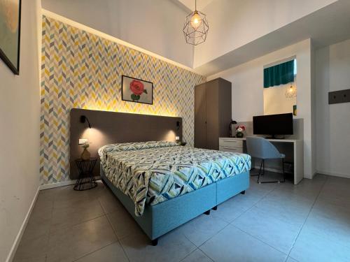 Ένα ή περισσότερα κρεβάτια σε δωμάτιο στο Sisan Family Resort