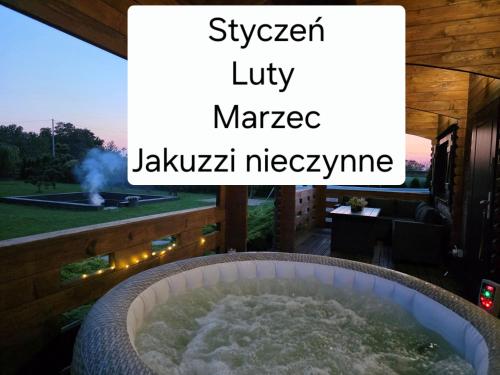 Φωτογραφία από το άλμπουμ του Domek całoroczny MAGJAN z sauną i jacuzzi na wyłączność σε Zlotow