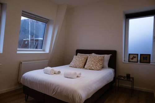 Кровать или кровати в номере Klein Witje