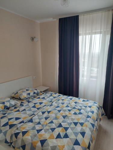 Postel nebo postele na pokoji v ubytování PetruHome