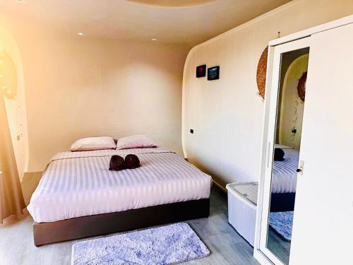 Ein Bett oder Betten in einem Zimmer der Unterkunft Sky View House Proy