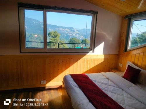 Γενική θέα στο βουνό ή θέα στο βουνό από  αυτό το δωμάτιο σε οικογενειακή κατοικία