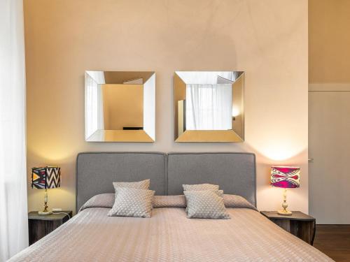 Ένα ή περισσότερα κρεβάτια σε δωμάτιο στο Hotiday Cagliari Porto