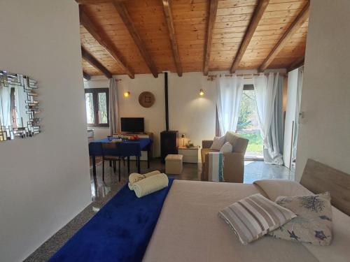 Postel nebo postele na pokoji v ubytování Smeralda Pic House