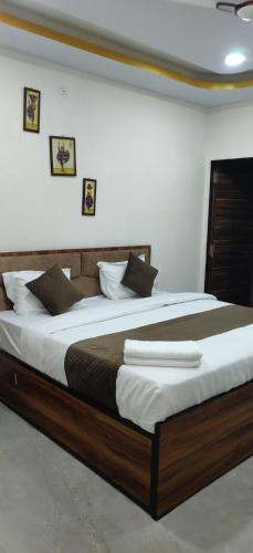 Postel nebo postele na pokoji v ubytování Hotel Casa Premier