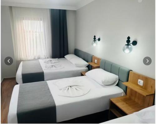 Giường trong phòng chung tại Avka Palace